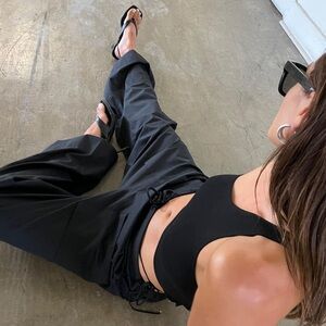 Black local European wide leg parachute pants in XS/S